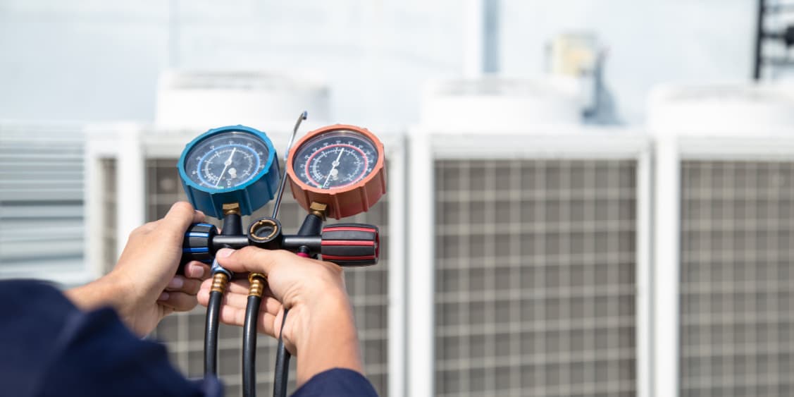 technician checking air conditioning