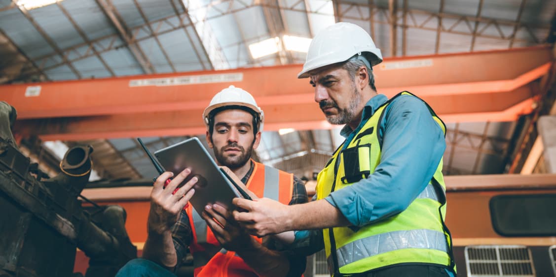 Two Engineers look over file