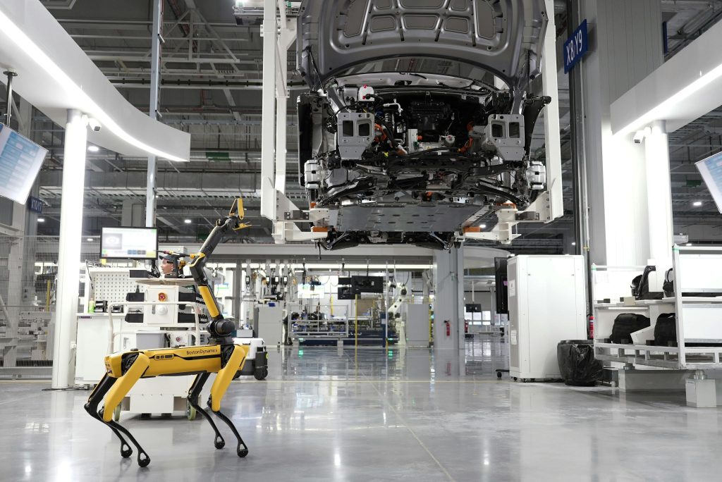 A robot dog on a car production line