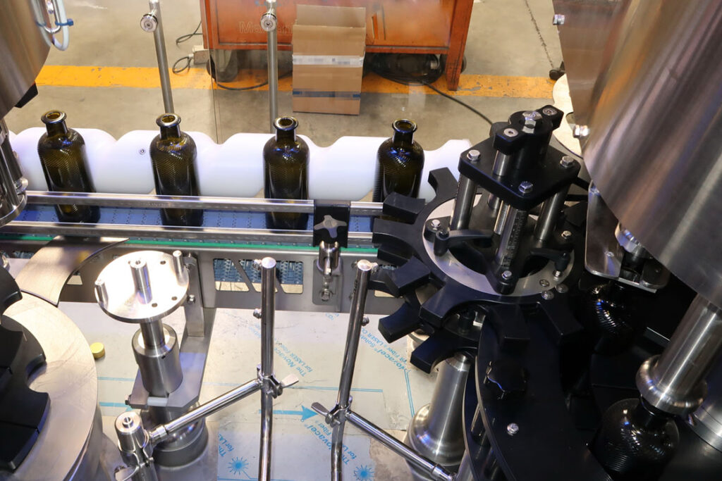 A bottling conveyor system utilising Danfoss iC7 Automation Drives available from Danfoss Drives Authorised Partner LED Controls.