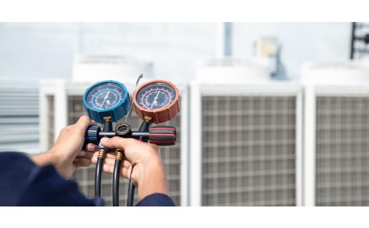 technician checking air conditioning